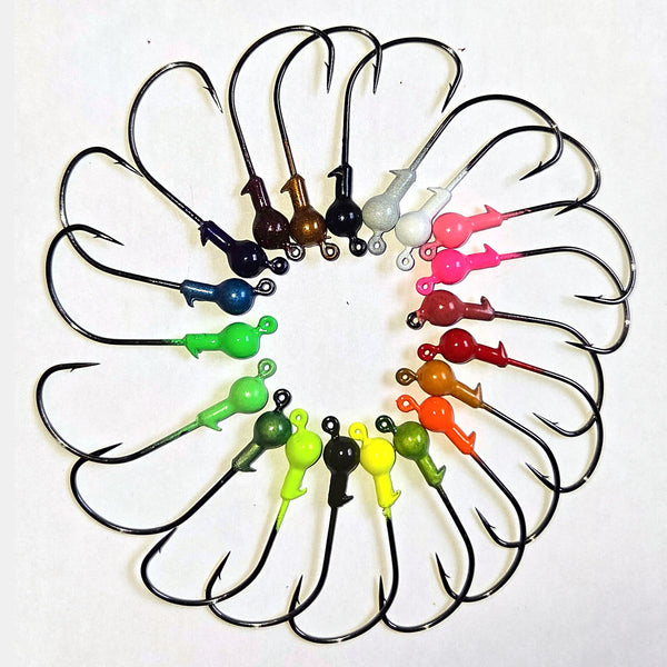Kahle Keeper ball head inshore jig heads with bait keeper in glow, chartreuse, pink and root beer colors