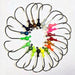 Kahle Keeper ball head inshore jig heads with bait keeper in glow, chartreuse, pink and root beer colors